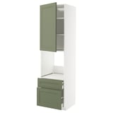 Green and white METOD kitchen cabinet with pull-out drawer and open door.