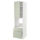 Green METOD kitchen module with drawers and shelves.