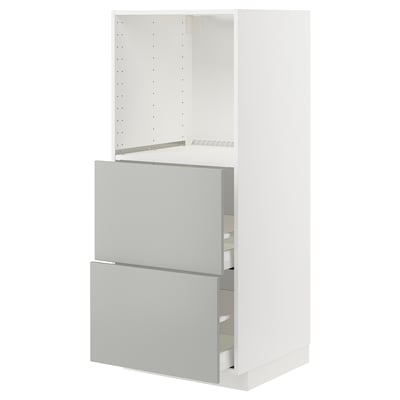 This image shows a white and light grey modern ikea METOD kitchen unit with open drawers.