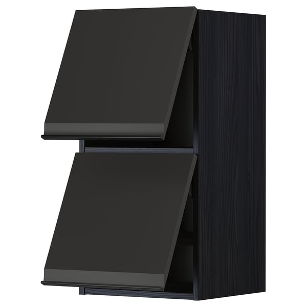 Black kitchen cabinet, modern upplöv design, two angular doors, dark wood finish.