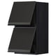 Black kitchen cabinet, modern upplöv design, two angular doors, dark wood finish.