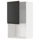 A modern, white ikea METOD wall cabinet with a black door, designed for kitchen storage.