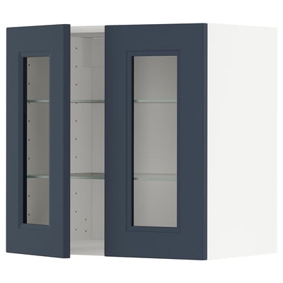 Blue glass-doored METOD wall cabinet.