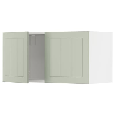 METOD kitchen unit in green. Two closed panels, one open revealing shelves.