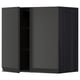 Black METOD kitchen cabinet, rectangular with one open door showing shelves.