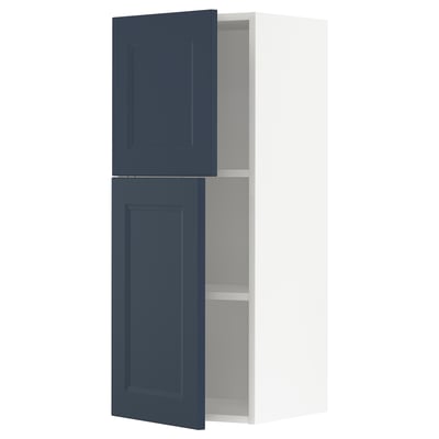 Ikea METOD kitchen cabinet, blue, modern design, two-door, white interior.