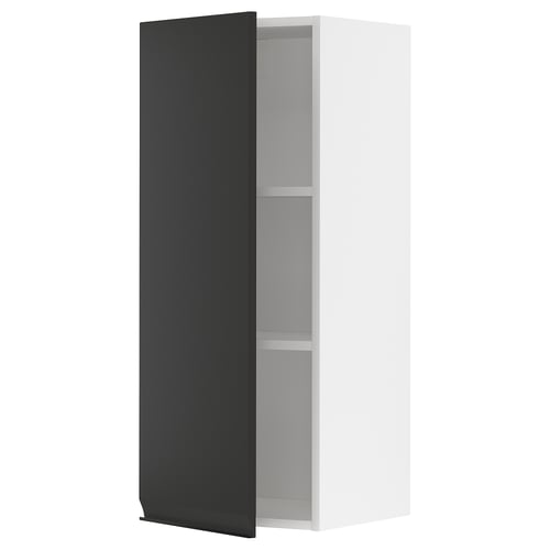 Modern white cabinet with black door, open showing two shelves. Sleek, minimalist design.