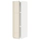 High gloss beige IKEA METOD kitchen cabinet with modern handles.