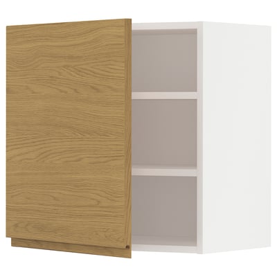 Open light wood cabinet with shelves against white background.