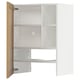 METOD kitchen unit in white with oak veneer doors open, revealing adjustable shelves.