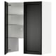 A METOD kitchen cabinet with a black stained lerhyttan door featuring bevelled edges. The cabinet is open, revealing adjustable shelves.