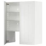 A white METOD kitchen cabinet with an open door, revealing adjustable shelves inside.