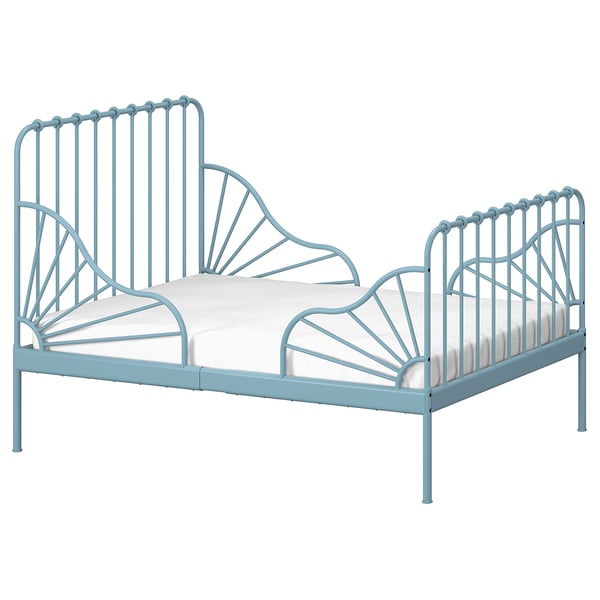 An extendable MINNEN bed in blue, featuring a metal frame with a fan-shaped headboard and vertical bars on the sides. It accommodates a mattress.