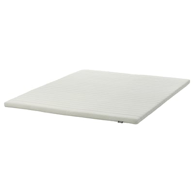 NISSEHOLM mattress pad in white, featuring soft foam for firm sleep, with removable cover for easy cleaning.