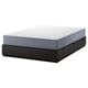 A gray NORDLI bed frame with six drawers and a white mattress, ideal for small spaces with extra storage.