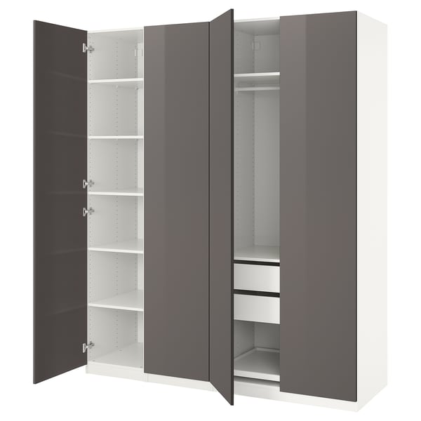 A grey and white ikea PAX wardrobe with open doors revealing shelves and drawers.