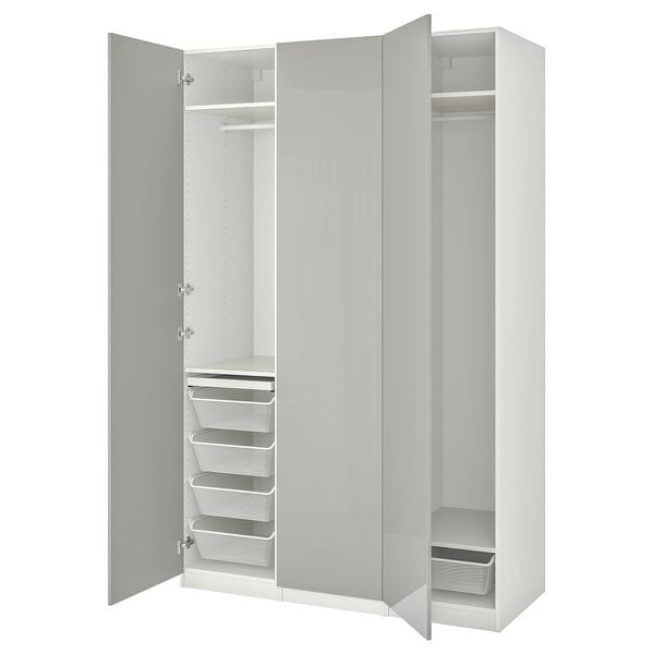 White PAX wardrobe with mesh baskets, shelves, and drawers in a clean, modern design.