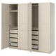 Option: An open beige PAX wardrobe with drawers and shelves. It a sleek design with soft closing hinges.