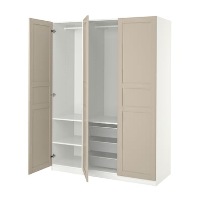 White ikea PAX wardrobe with beige doors, open showing wire shelves and mesh baskets.