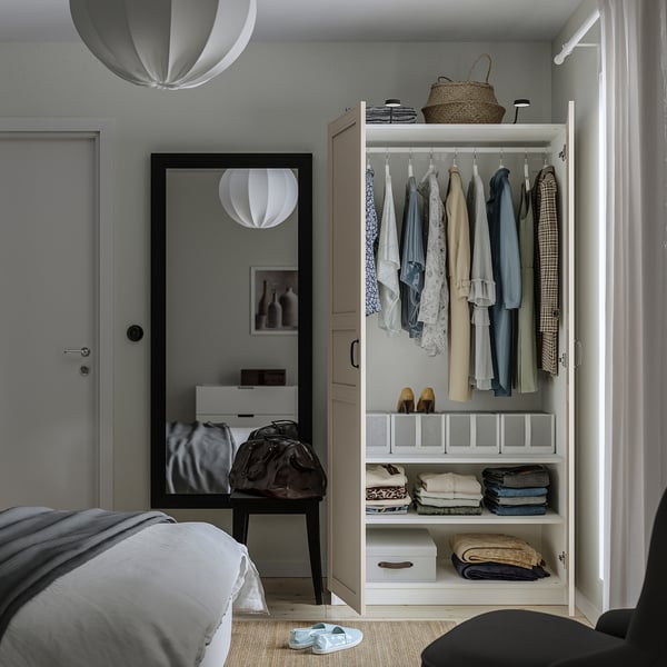 Modern bedroom with PAX wardrobe, mirror.