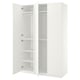 Option: White PAX wardrobe, open, displaying empty shelves and hanging rail. Modern minimalist design in smooth material.