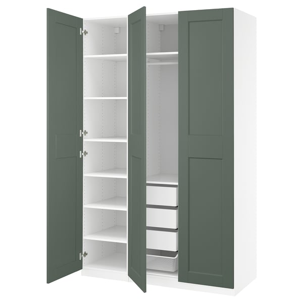 Green PAX wardrobe with shelves and mesh baskets, wide open.