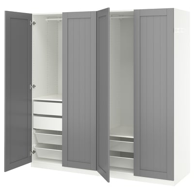 An open gray ikea PAX wardrobe with mesh drawers and shelves for clothes storage.