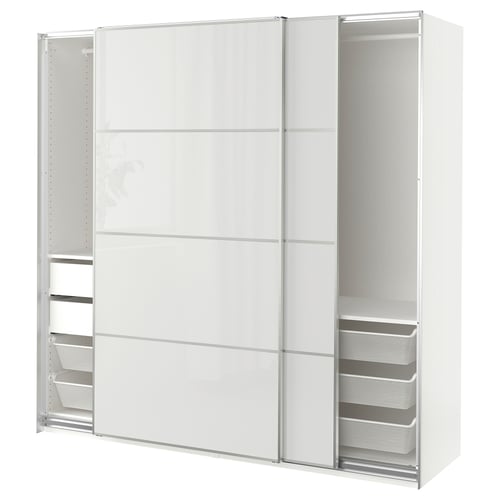 A white PAX wardrobe with mirrored sliding doors and mesh drawers. Its sleek, modern, and designed for efficient organisation.
