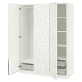 A white ikea PAX wardrobe with open doors, revealing shelves and mesh drawers, and a floral-patterned back panel.