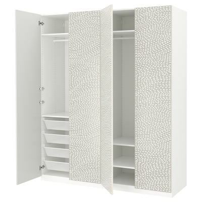A white ikea PAX wardrobe with a patterned door and open compartments. It shelves, a clothes rail, and mesh baskets.