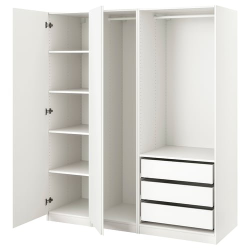 A white ikea PAX wardrobe set with open doors revealing shelves and drawers.