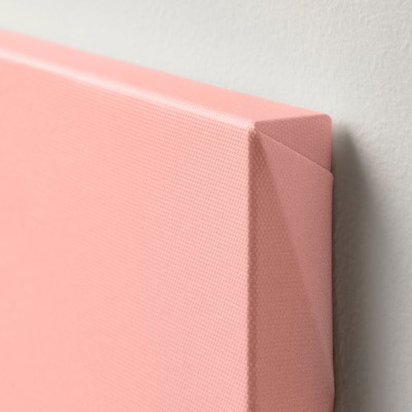 Close-up of a high-quality canvas with a matte texture, part of a decorative picture frame.