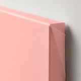 Close-up of a high-quality canvas with a matte texture, part of a decorative picture frame.