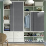 Modern wardrobe with sliding doors, shelves, drawers, and hanging space for efficient clothing and accessory storage.
