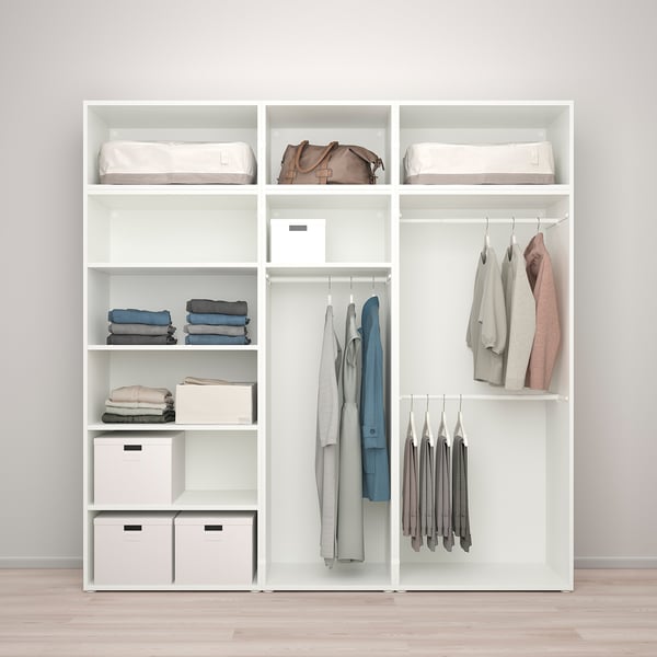 Modern closet system with shelves, hanging rods, and accessories storage.