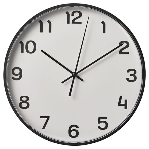 Modern alarm clock, round white face with black numbers and hands, silent quartz movement, minimalist sleek design.