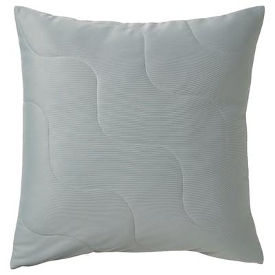 Light grey turquoise square throw pillow with wave pattern and quilted texture.