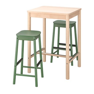 A light wood square RÖNNINGE bar set with two green stools.