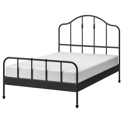 SAGSTUA bed: black metal, brass accents, curved headboard, slatted base.