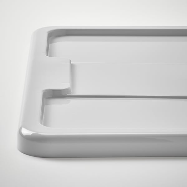 Close-up of a durable, stackable plastic lid with a secure click lock.