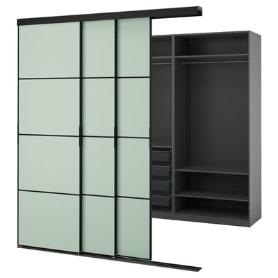 Modern black and glass wardrobe with sliding doors. One door open revealing shelves and storage.