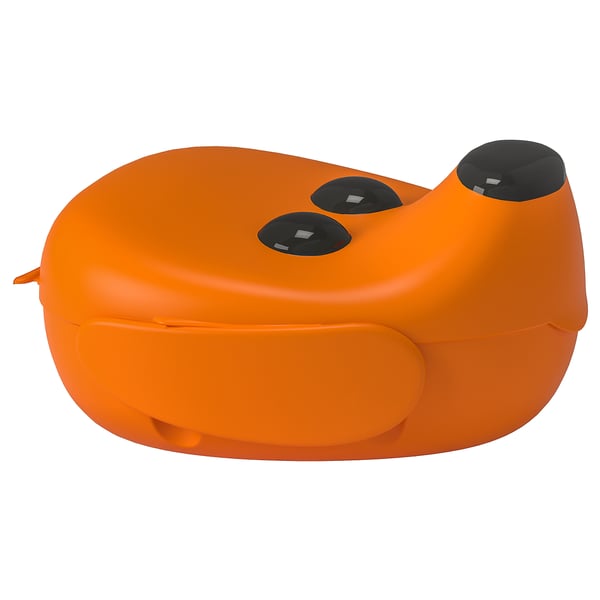 Bright orange plastic lunchbox with round black eyes, designed like a cartoon character.