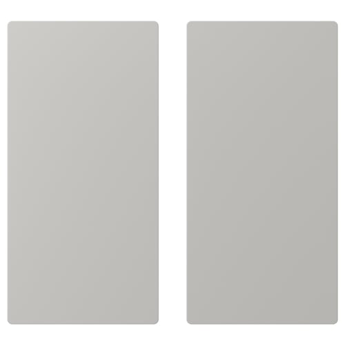 Two grey rectangular panels, likely doors for SMÅSTAD storage, featuring soft rounded edges and a simple, modern design.