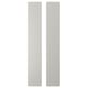 Option: Two vertical white rectangular panels, part of a kids storage unit, made from fiberboard with rounded corners.