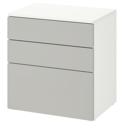 A white SMÅSTAD chest of three drawers, ideal for childrens rooms, with a minimalist design and space-saving.