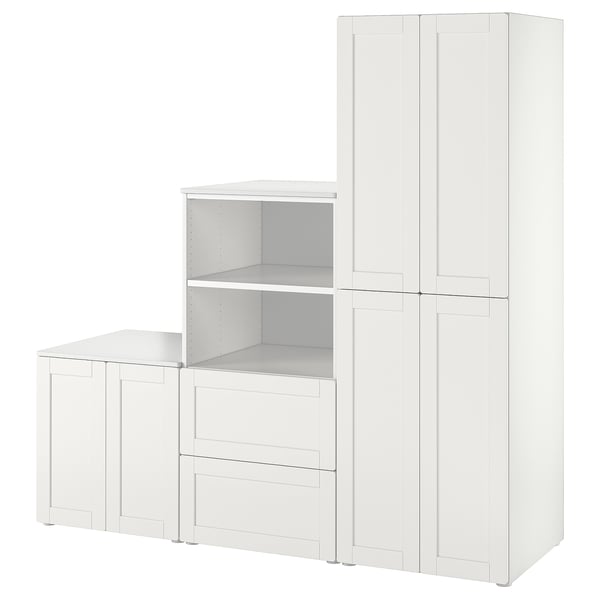 White kids wardrobe set with drawers, shelves, and hanging space. Modern, clean design. Soft-closing doors. Suitable for sloped ceilings.