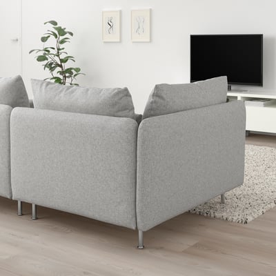 Modern living room with light gray SÖDERHAMN sectional, tv, plant, and rug.