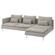 Gray modular sofa, l-shaped with numerous cushions, sleek legs, cozy, modern design.