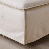 Close-up of SÖDERHAMN sofas plush, cream-colored seat. Soft, textured fabric, seams neatly finished.