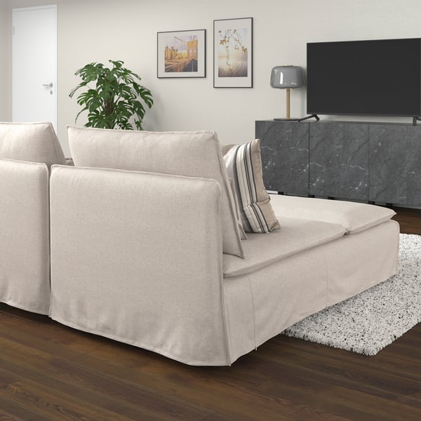 SÖDERHAMN beige fabric sofa with chaise, light wooden floor, gray marble tv unit, modern decor. Low, deep seats, stylish, airy look.